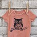 Peach Owl Baby Bodysuit, Cotton Baby Onesie, light coral or custom colors.
