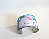 Hello Kitty bracelet, license plate cuff bracelet, collectors plate, up-cycled bracelet, eco gift, green gift, license plate jewelry