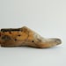 One industrial rustic wood shoe form