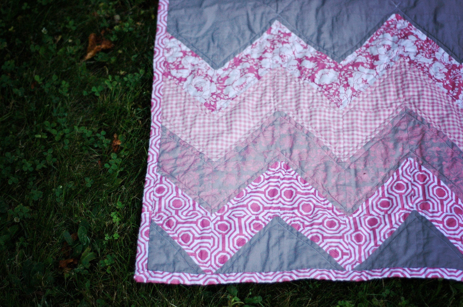 Baby Quilt in Chevron Pattern of Pinks and Grays