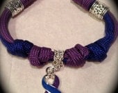 Prayer Beads Paracord Bracelet with Rheumatoid Arthritis Awareness Ribbon charm and decorative charm