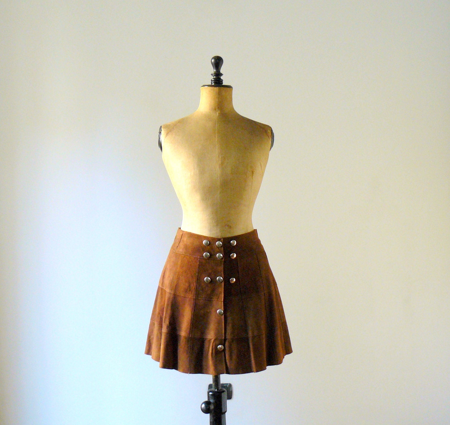 Vintage 1970s brown suede mini skirt. A line metal buttons miniskirt