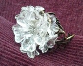 Paperwhite, adjustable ring in shades of clear lucite