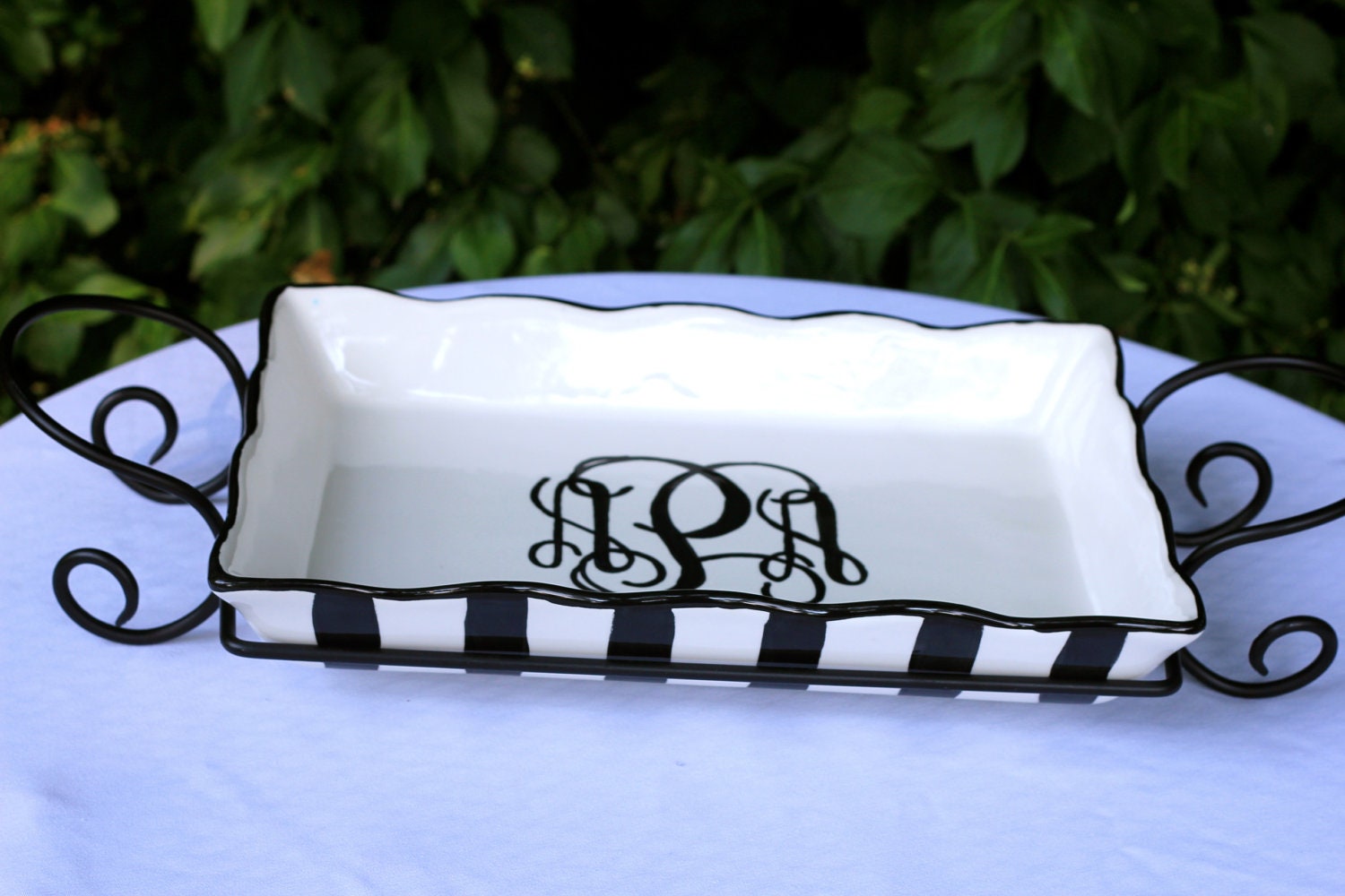 Monogrammed serving tray with iron stand