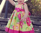 Girls Sundress...Girls Flower Dress. Features Adjustable Straps and interchangeable flower bow