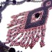Beaded Purple Necklace with Fringe Design