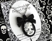 Black and White Skeleton Cameo with Bow Frame on a 18" Ball Chain Necklace