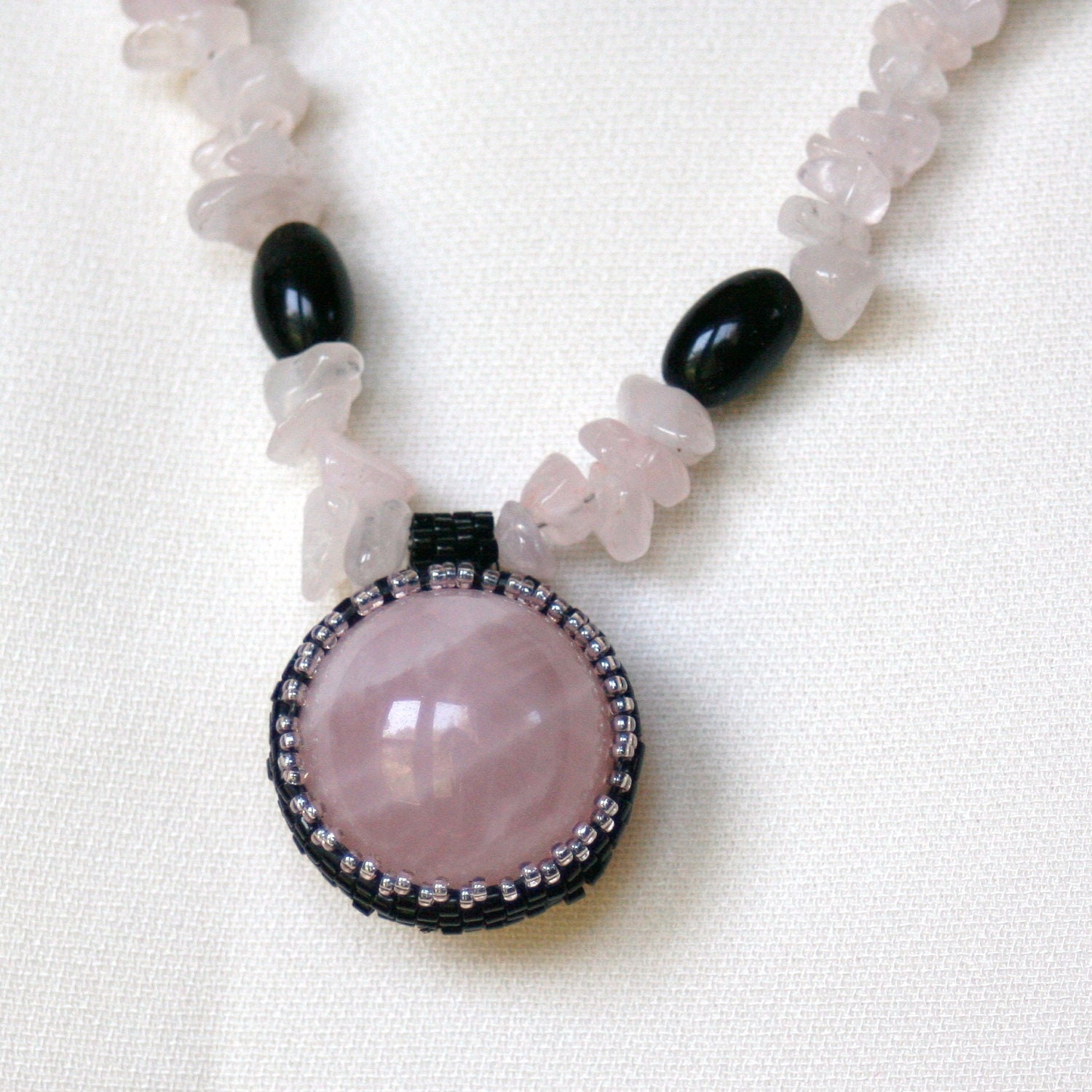 Rose Quartz Sphere with Black and Silver beads