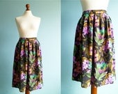Vintage floral print skirt / black green violet yellow / knee lenght / medium