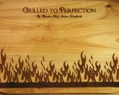 Laser engraved barbeque wood cutting/serving board for the master griller in your life.