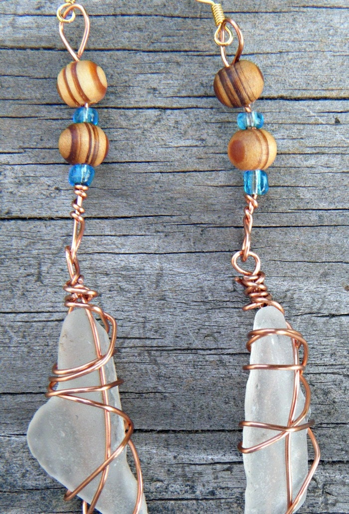 Beach Jewels. Wire Wrapped Sea Glass Earrings. Sea glass earrings wrapped in copper with wood beads. ON SALE WAS 12.00