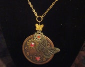 Steampunk butterfly vintage look necklace with clock face on chain
