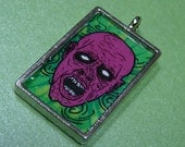 Pink Zombie Resin Pendant in silver-tone bezel