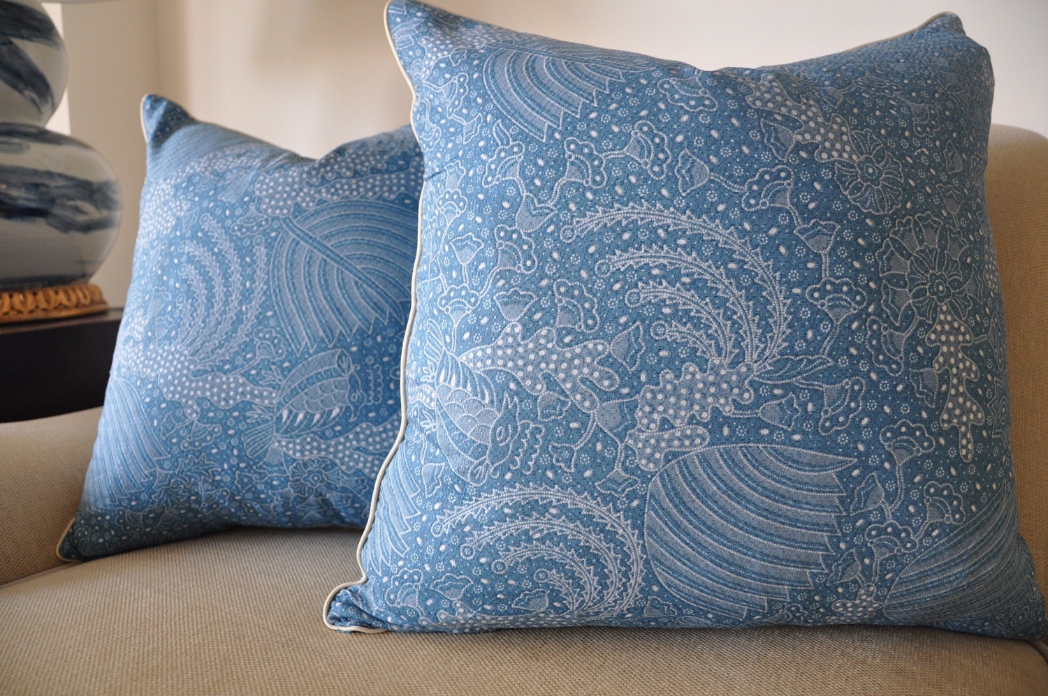 A Blue and Cream Batik Pillow