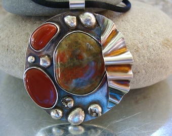 Lake Superior Stones set in Silver and Fine Silver