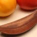 wooden saute spatula carved with an ergonomic handle
