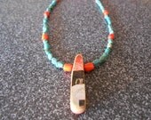 Recycled / upcycled skateboard deck Necklace with turquoise black red white one of a kind