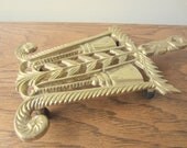Brass trivet.  Brass pot holder.  Kitchen decor.