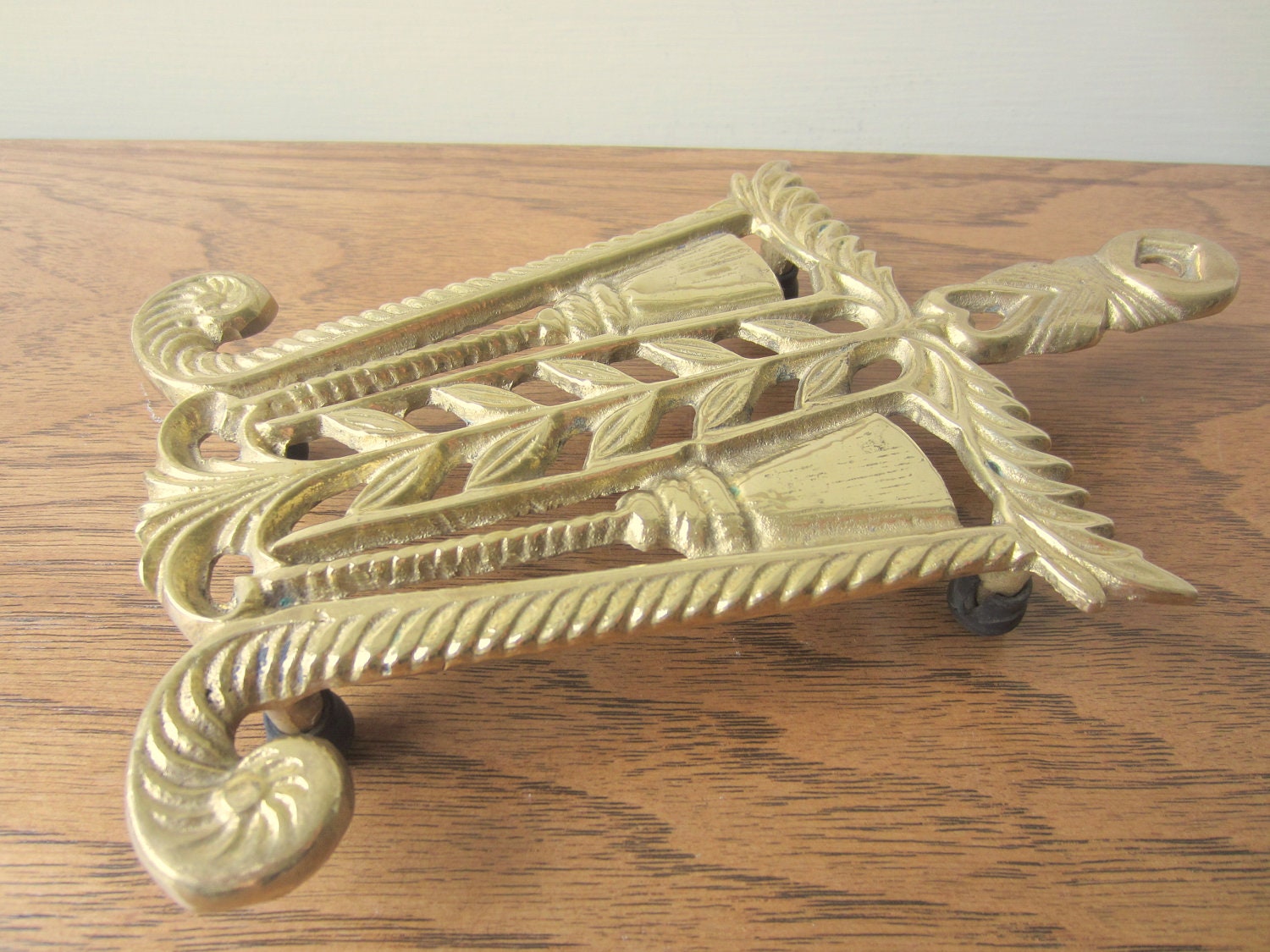 Brass trivet.  Brass pot holder.  Kitchen decor.