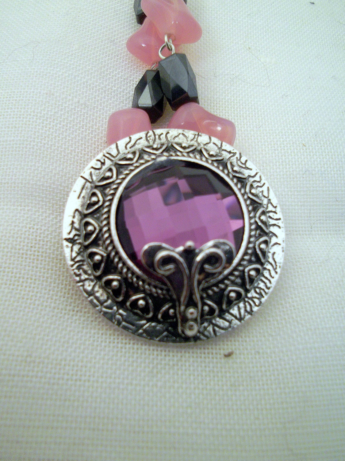 Purple faceted glass in silver setting, rosary chain, pink glass and magnetic hematite necklace: Purple Peace