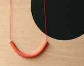 not quite a semi circle makes a necklace