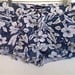 High Waisted Blue and White Floral Print Studded Distressed Denim Shorts