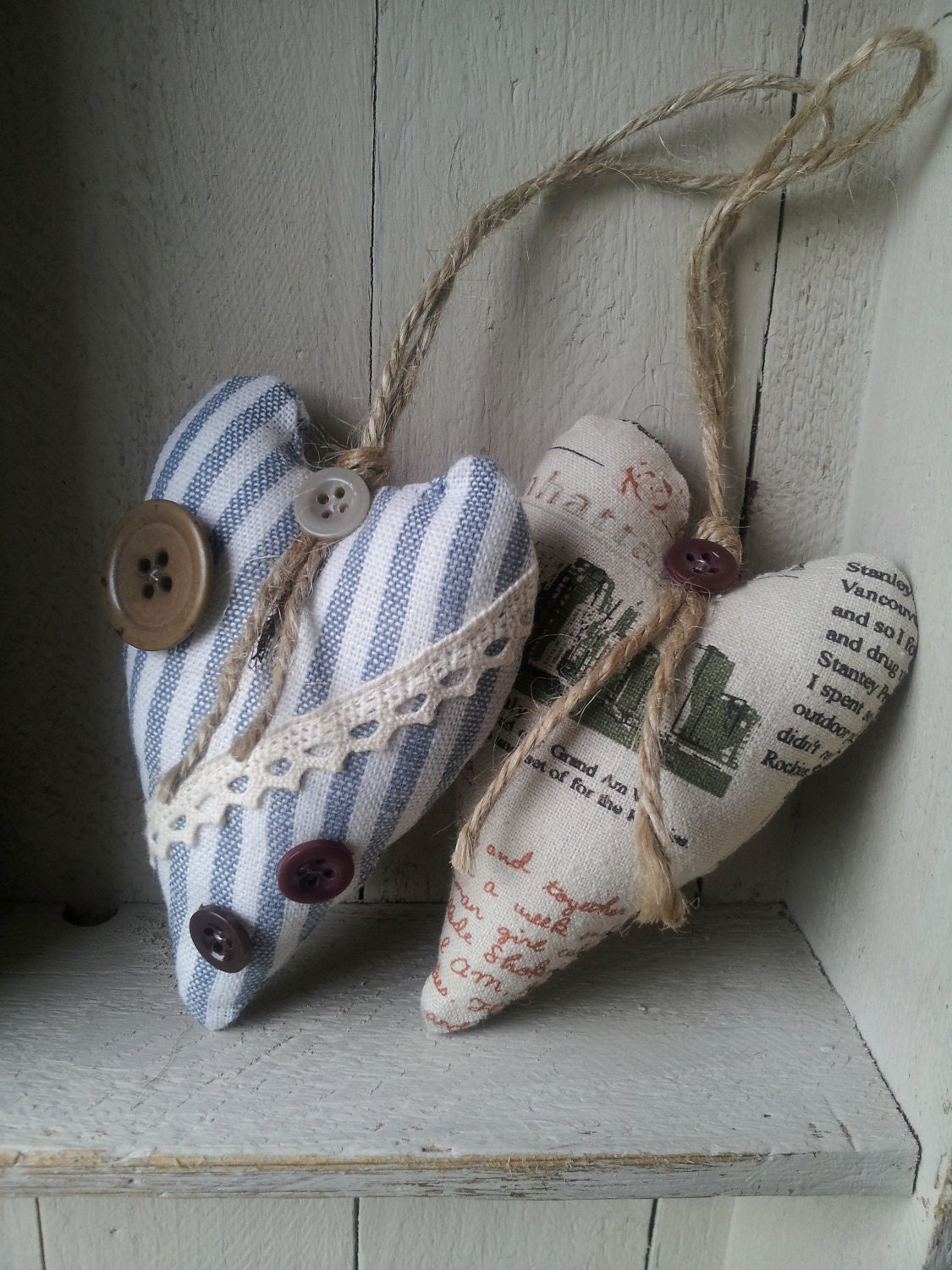 Decorative French ticking and linen heart duo. 'The Travellers'