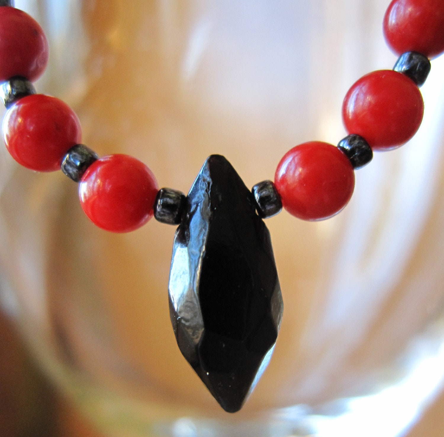 red coral beads, black czech vintage bead, oval shape earrings, sterling wires