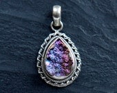 titanium quartz druzy pendant. perfect centerpiece for hemp, or alone on a chain.