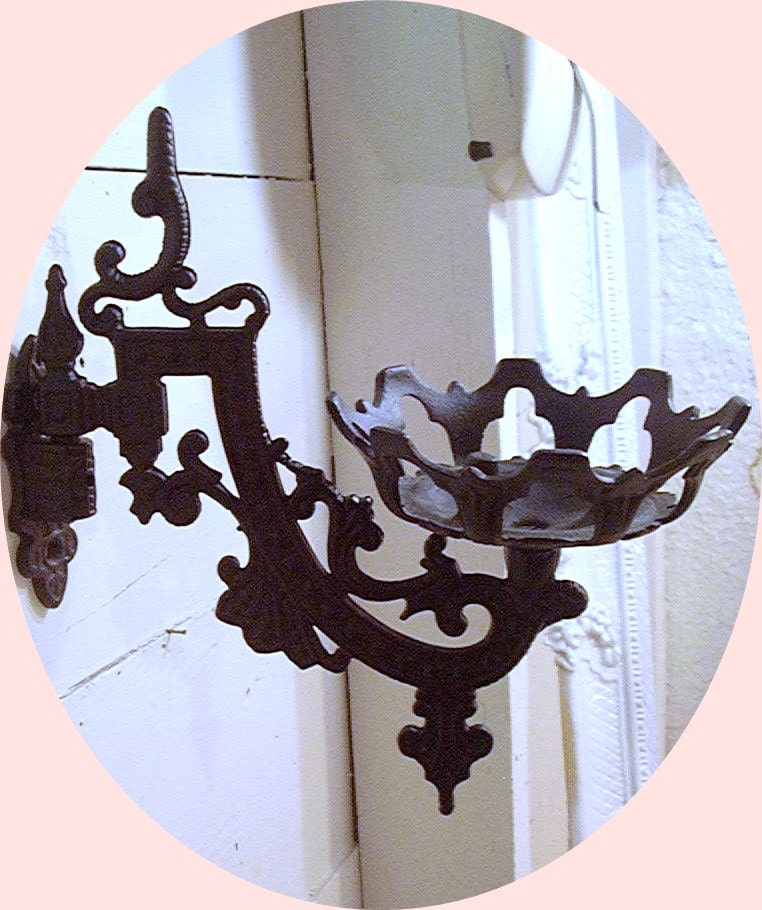 Antique Cast Iron Candle Holder Wall Hanging by AnnClarkInteriors