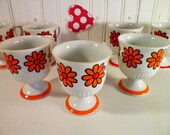7 Pedestal Coffee Mugs/Orange Daisy Pattern/1970s