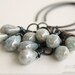 Earrings wire wrapped with antique brass wire with blue czech glass picasso drop beads.