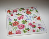 Handmade porcelain ceramic tile coaster, in clear glaze with pink and orange flower design