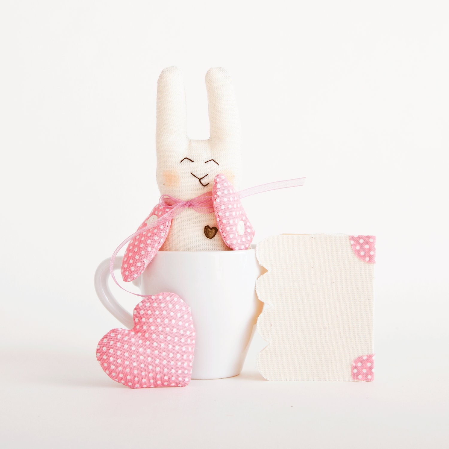 Gift Valentine's Day. Bunny rabbit handmade with a heart and card in a gift box