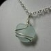 Wire wrapped pale blue sea glass necklace
