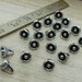 pkg of (20) - 8mm Silver Flower Drops