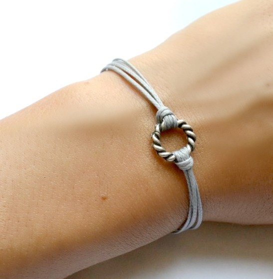 Karma bracelet - gray cord bracelet with a silver plated circle charm, Friendship bracelet, stack bracelet, arm candy