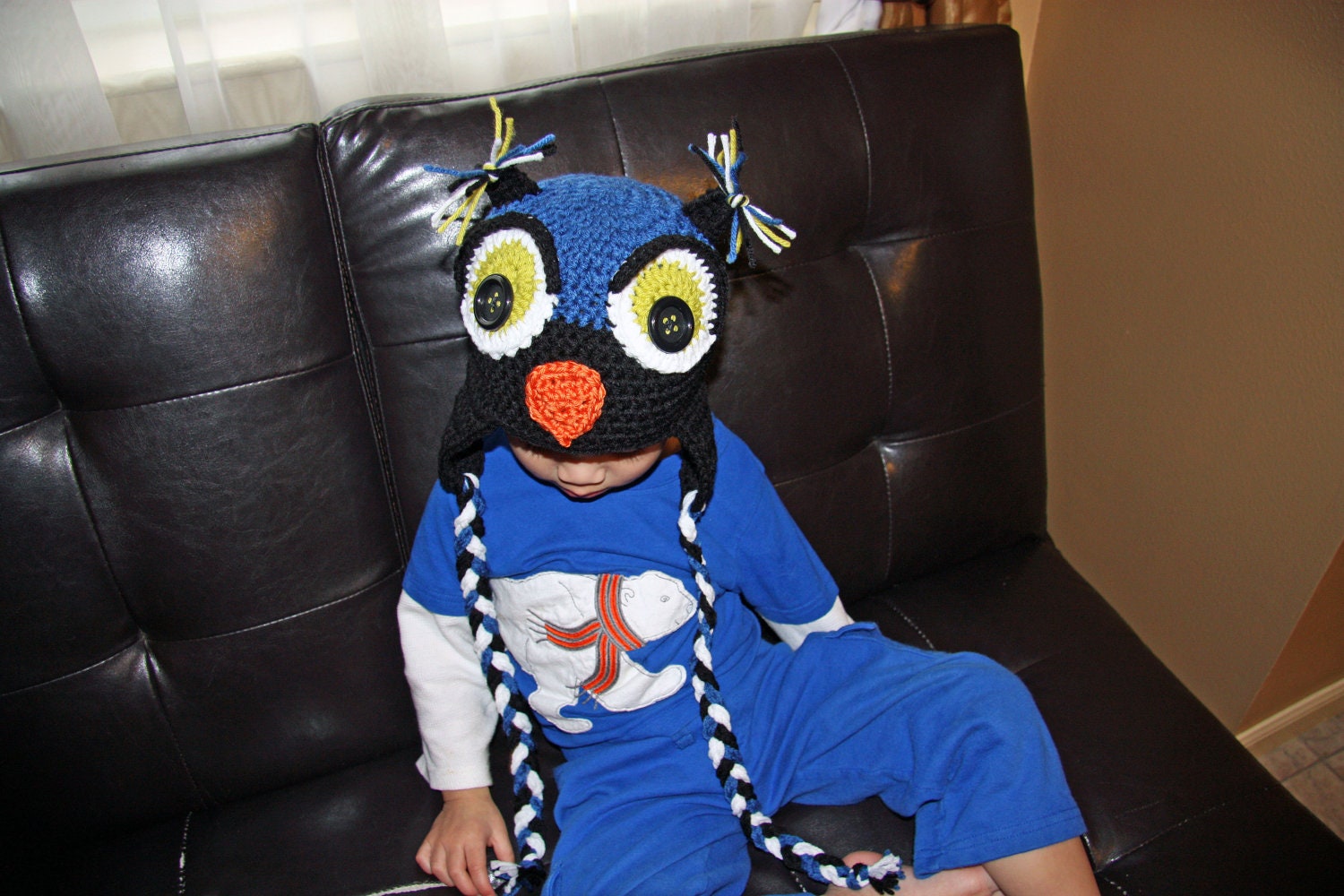 Handmade crochet black, blue, and white owl hat or beanie with flaps and braids (available sizes: 0-3, 3-6, 6-12 MOS, XXS, XS, S, M)