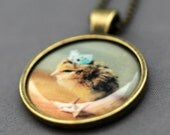 Photo Pendant Necklace of A Chick Wearing A Blue Crown