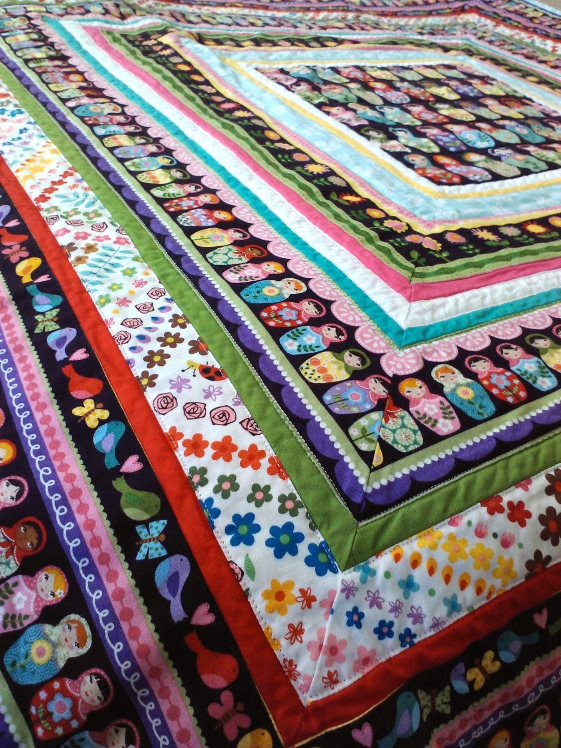 Bright and cheery Russian Matryoshka doll baby quilt- made to order