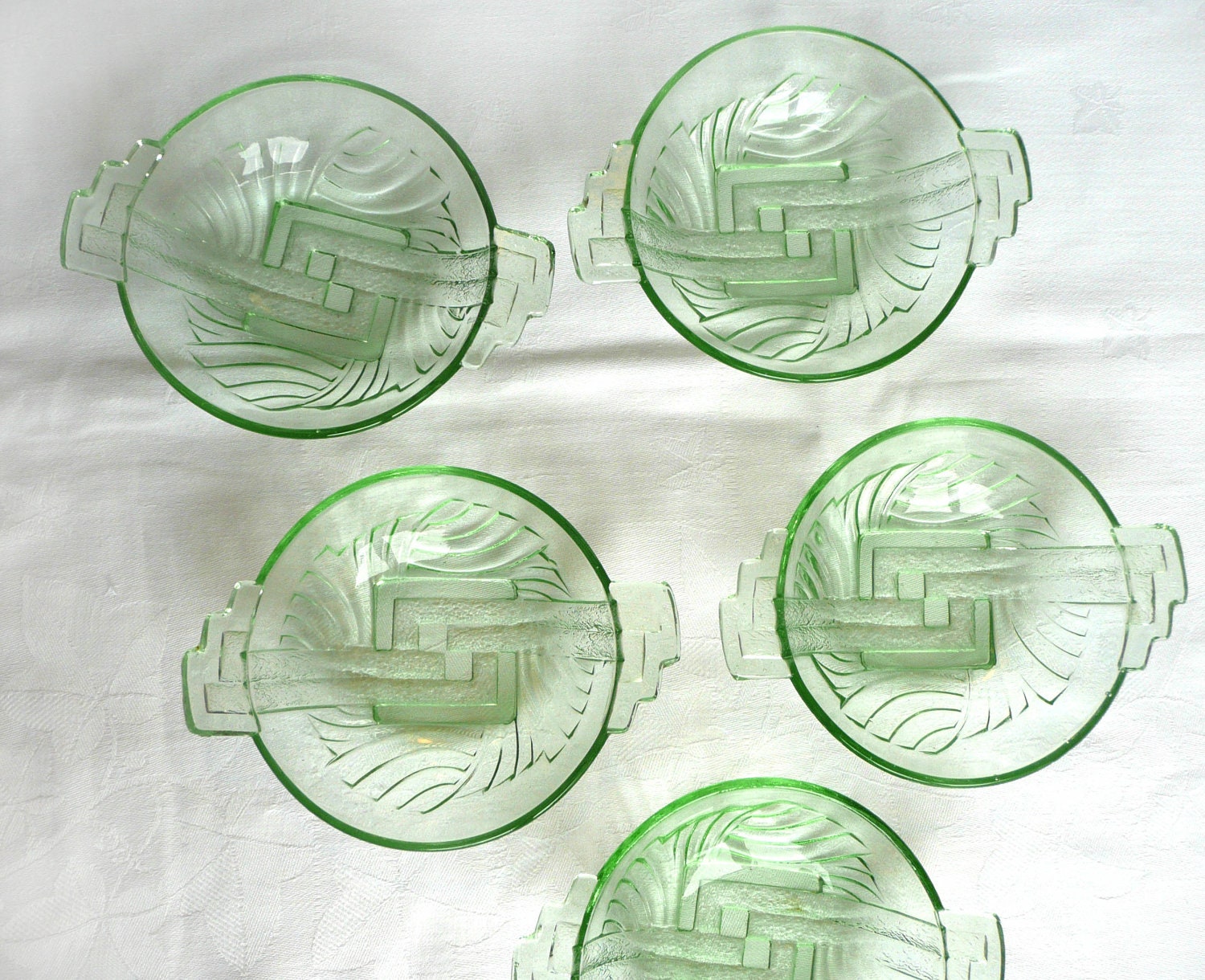 Art deco glass dishes, a set of five green glass Art Deco dessert dishes