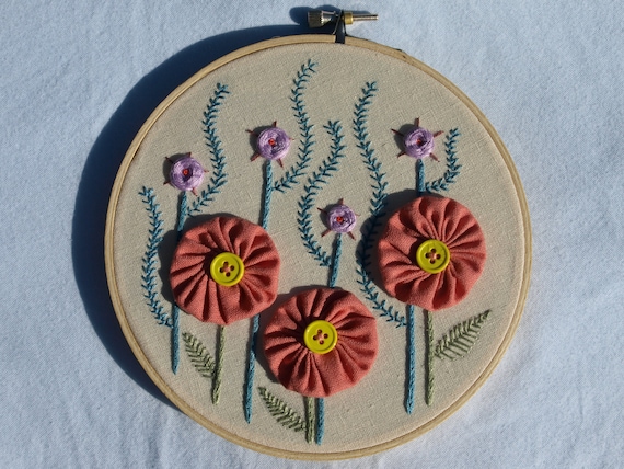 Hand embroidered flowers wall art ready to hang in 6" hoop.  Modern folk art