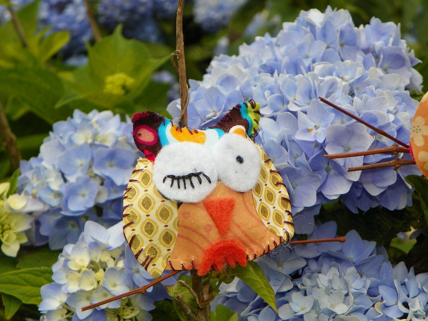 2 1/2 " x 3" stuffed owls made from felt, card stock and stitched by hand.