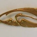 Art Deco style Brooch is unique and would make a great gift for a bird-lover.