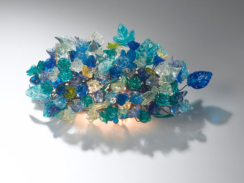 Wall lamp. Blue shades of flowers and leaves.