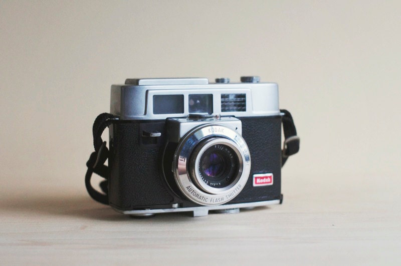 vintage 35mm film camera with beautiful leather case. kodak automatic 35f.