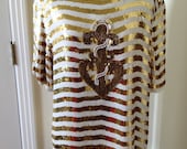 25% sale: Sequin anchor gold and white stripe trophy top