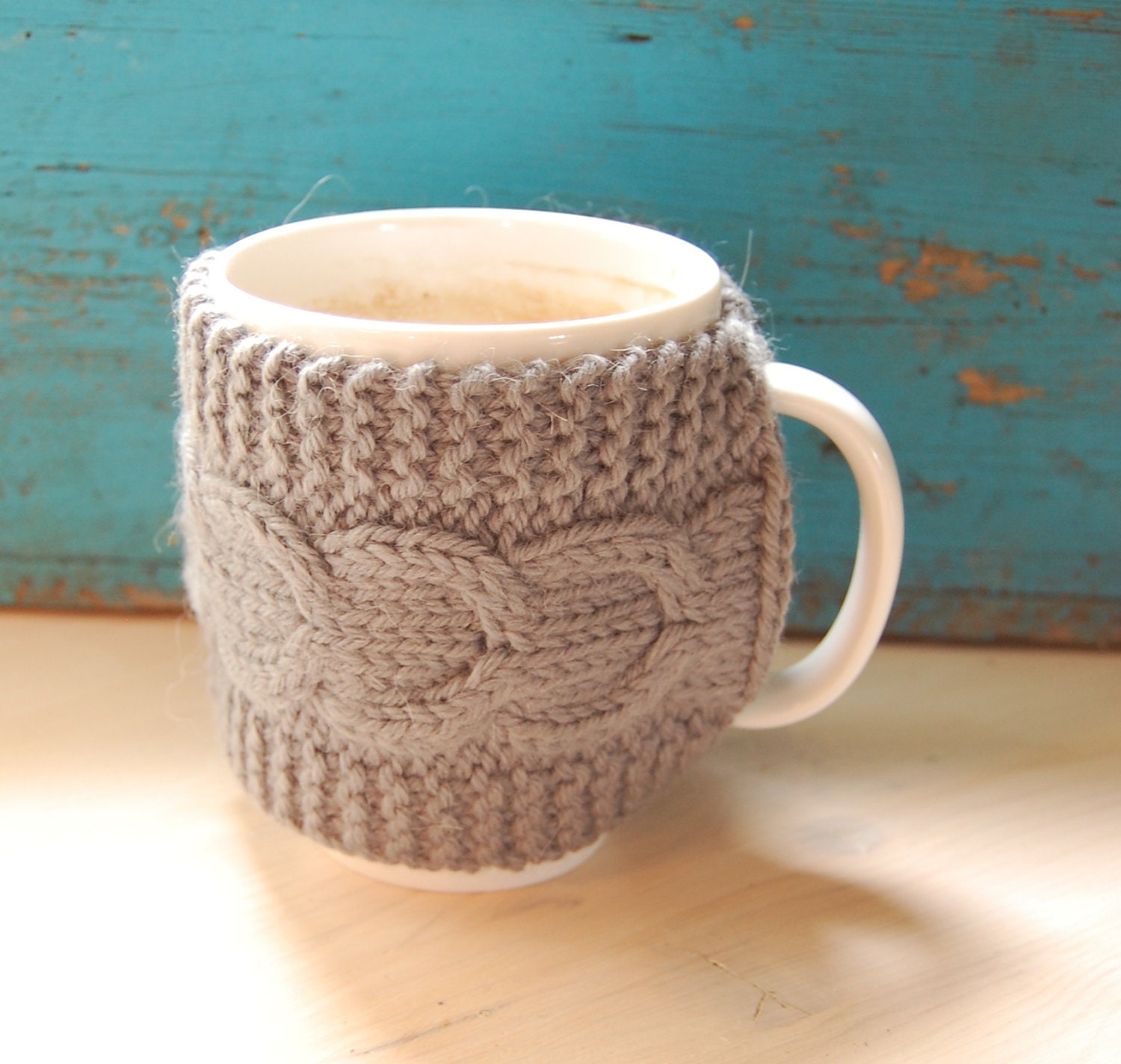 Knit coffee mug cozy with cable pattern, hand knitted, grey