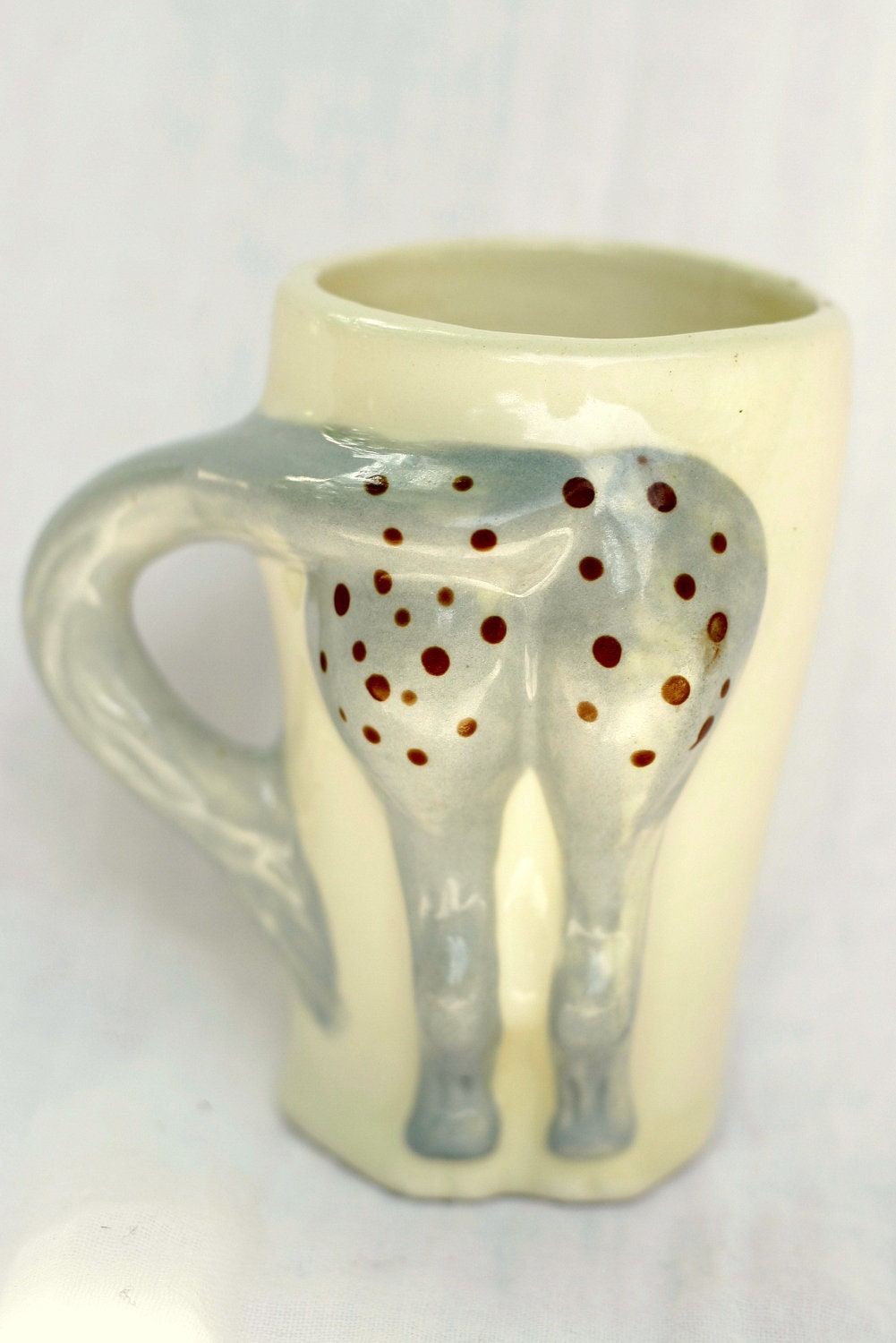 Horse's butt - "There's one in every family" pale blue, brown/cream, mug, cup, pencil holder