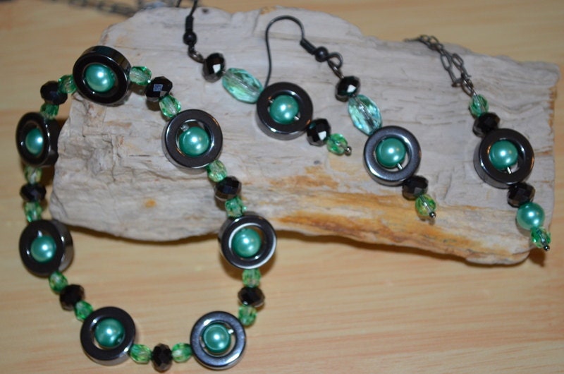 Exotic dark gray hematite open circles sea green simulated pearl centers green czech glass black crystals necklace, bracelet, earrings, set